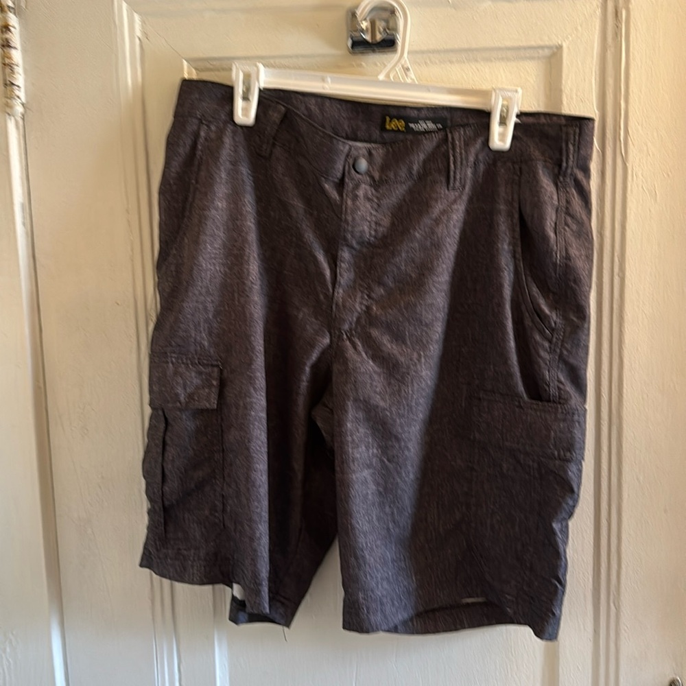 Heather gray men’s cargo shorts. Size 36. Never worn but washed.